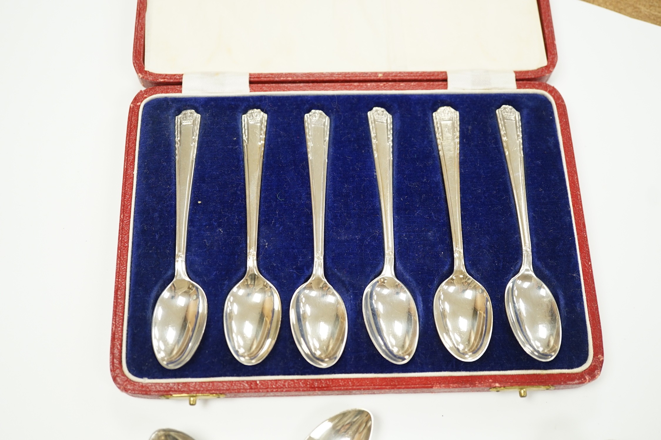 A quantity of assorted mainly 19th century silver flatware, various patterns, dates and makers, including a cased set of six 1937 Coronation silver teaspoons, four pairs of Georgian sugar tongs and a pair of Edwardian si
